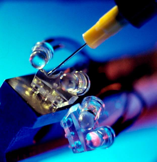 Optical lens UV adhesive