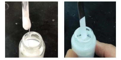 Titanium dioxide wetting aid
